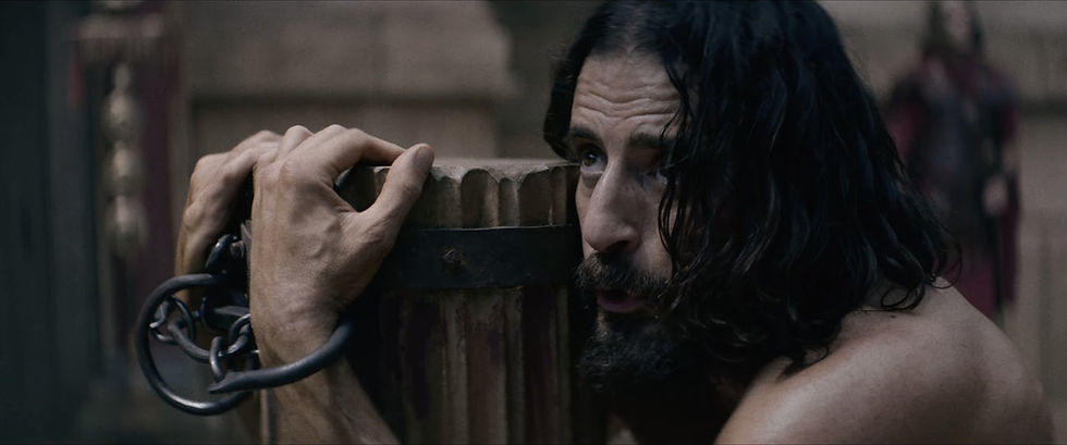 Mary covers her mouth as John and Mary Magdalene weep during the scourging
