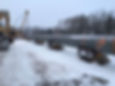 pipe being installed on a snow covered surface