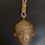 Thumbnail: Small African Mask Necklace with Leather Cord