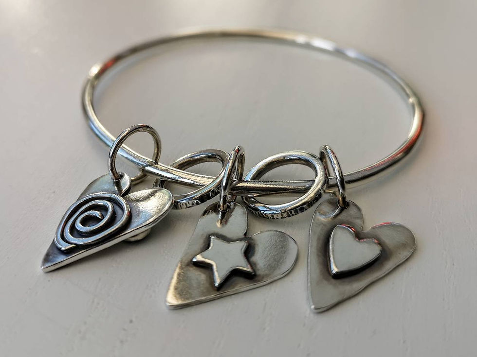 Thumbnail: Double sided triple heart bangle