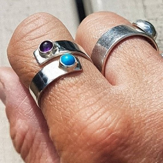 A gorgeous, adjustable, silver ring with a Blue Howlite gem and an Amethyst gems