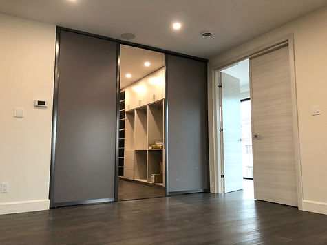 dark-grey-sliding-doors-for-walk-in-clos