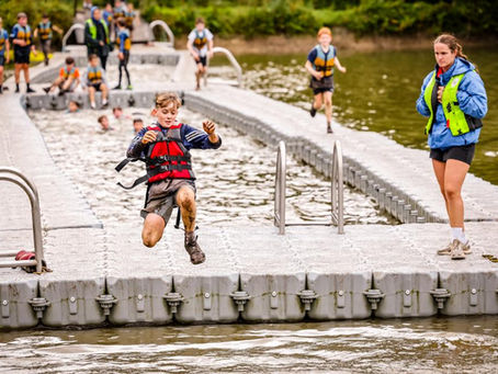 Boy jumps from Pontoon Mania into Lake at Hell & Back Junior