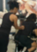 Licensed Massage Therapist providing a corporate chair massage