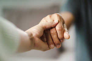 vecteezy_female-friend-or-family-holding-hands-during-cheer-up-to_2910155.jpg