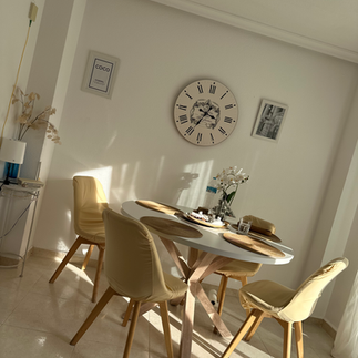 Modern dining area in a renovated attic apartment in Torrevieja near Playa de Los Locos