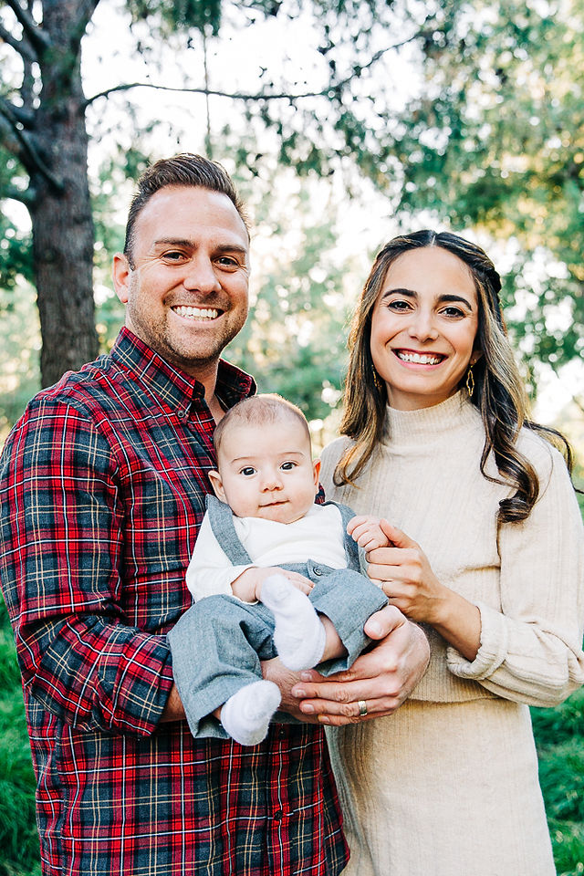 Mother and Father holding new baby boy 