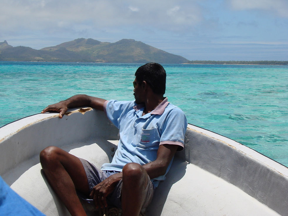 Pacific man looking out over a bay
