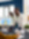 Woman conversing with colleague about photos in work environment
