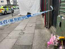 Man Charged in Shopkeeper’s Murder