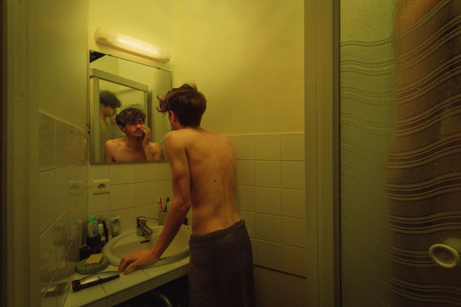 DEAR QUARANTINE,
Day 26, looking at my face in the mirror.