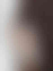 woman wearing spaghetti strap wrap silver sparkle mini dress