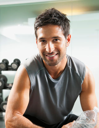 Gym Trainer with Grey Top - Corporate headshots in Dubai and Abu Dhabi