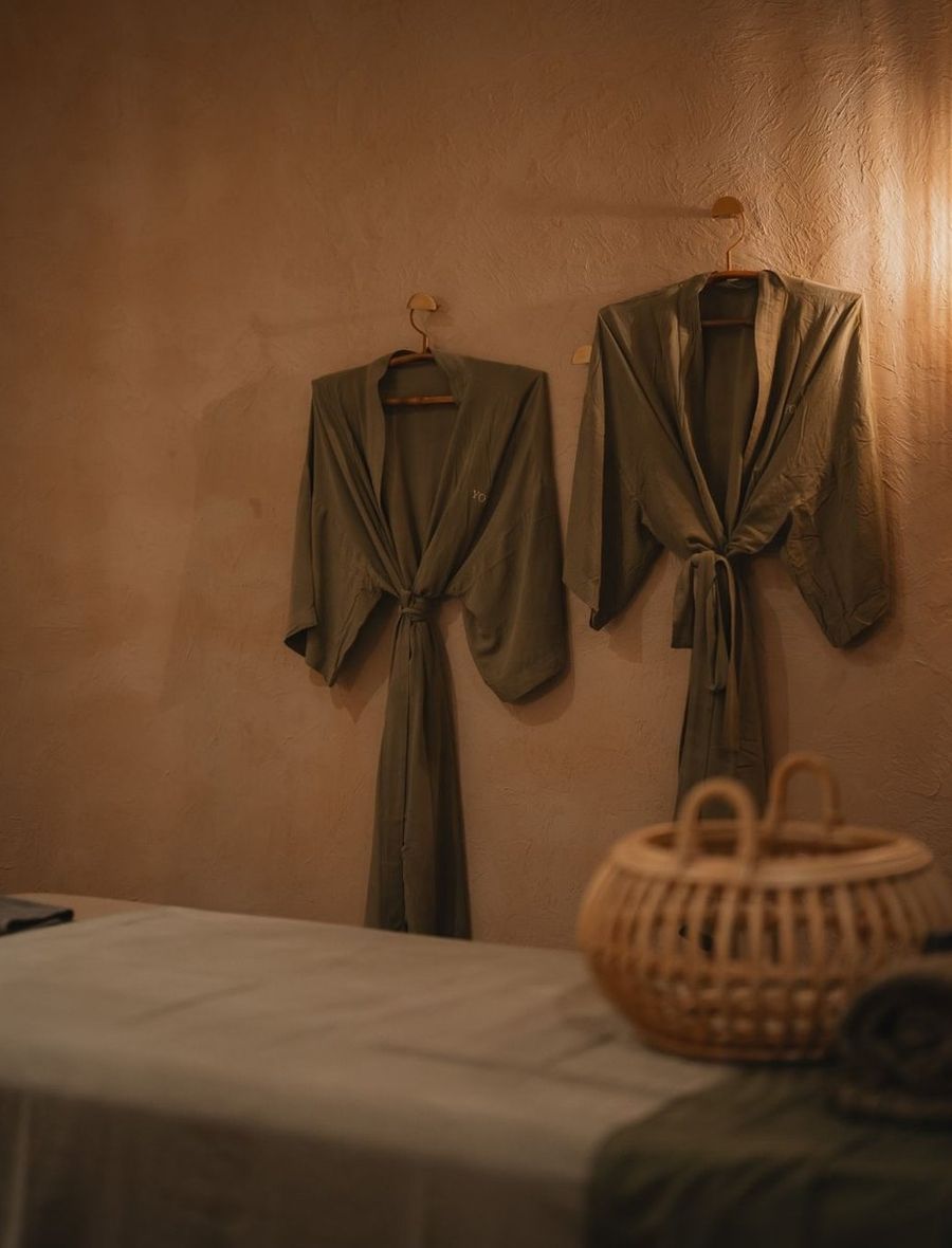 Soft robes folded in the spa