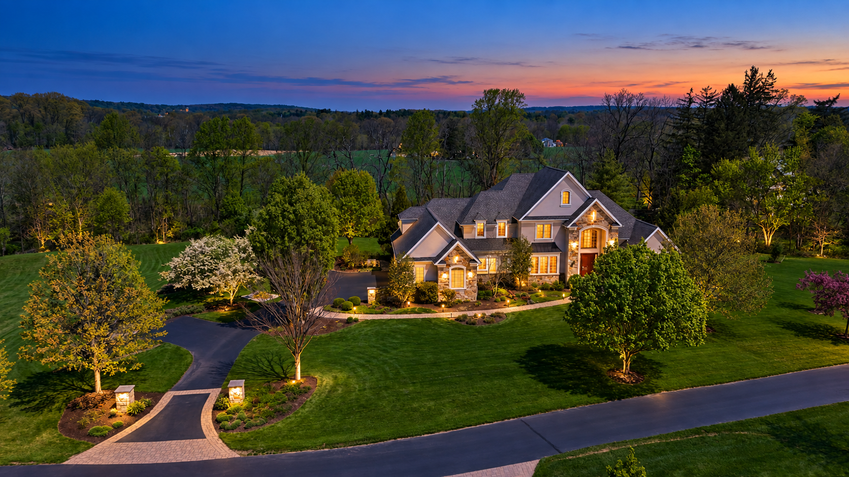 AI-assisted twilight interpretation of the same estate aerial with illustrative evening glow