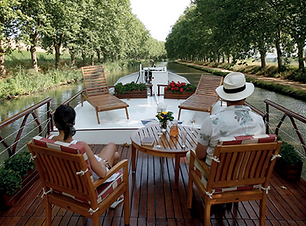 Cruise Trip Planner | GeoLuxe Travel | couple on yacht in France