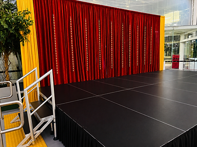Stage with Red Velvet drapes.png