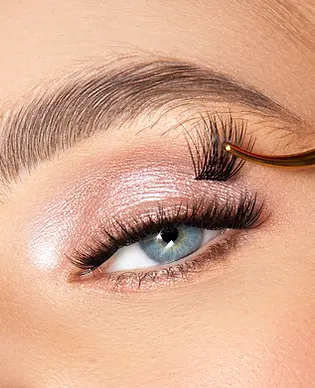 Temporary weekend lash set being applied for a fuller special occasion look