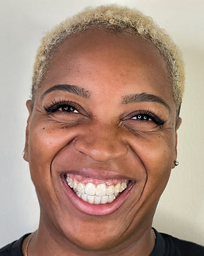 Smiling client after custom lash and brow services at Lucky Duck Lashes
