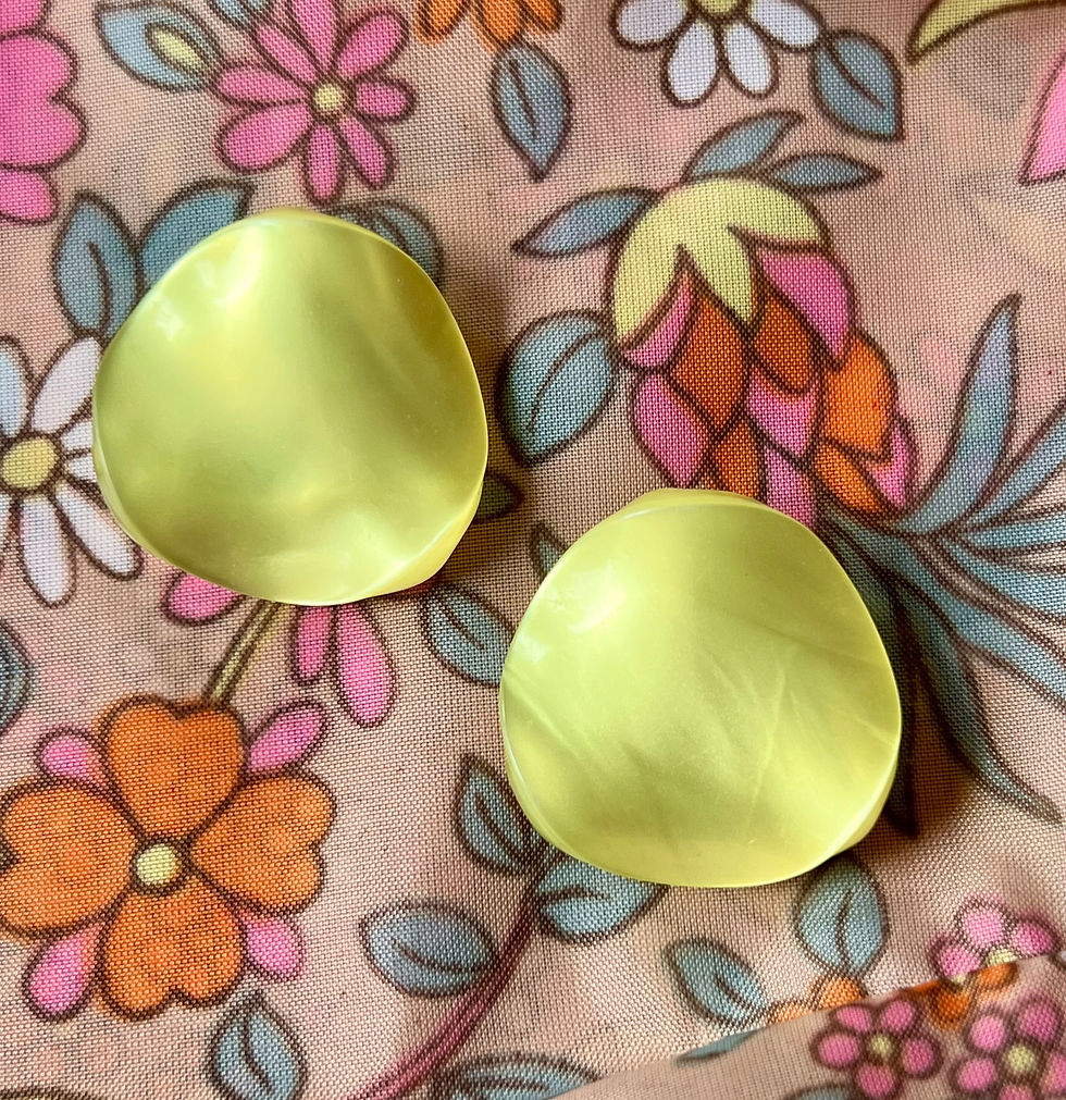 1970s Pearlescent Lemon Yellow Wavy Earrings Front Above View
