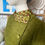 Thumbnail: Early 60s Olive Green Pink Fitted Boucle Style Wool Dress Front Side Collar View