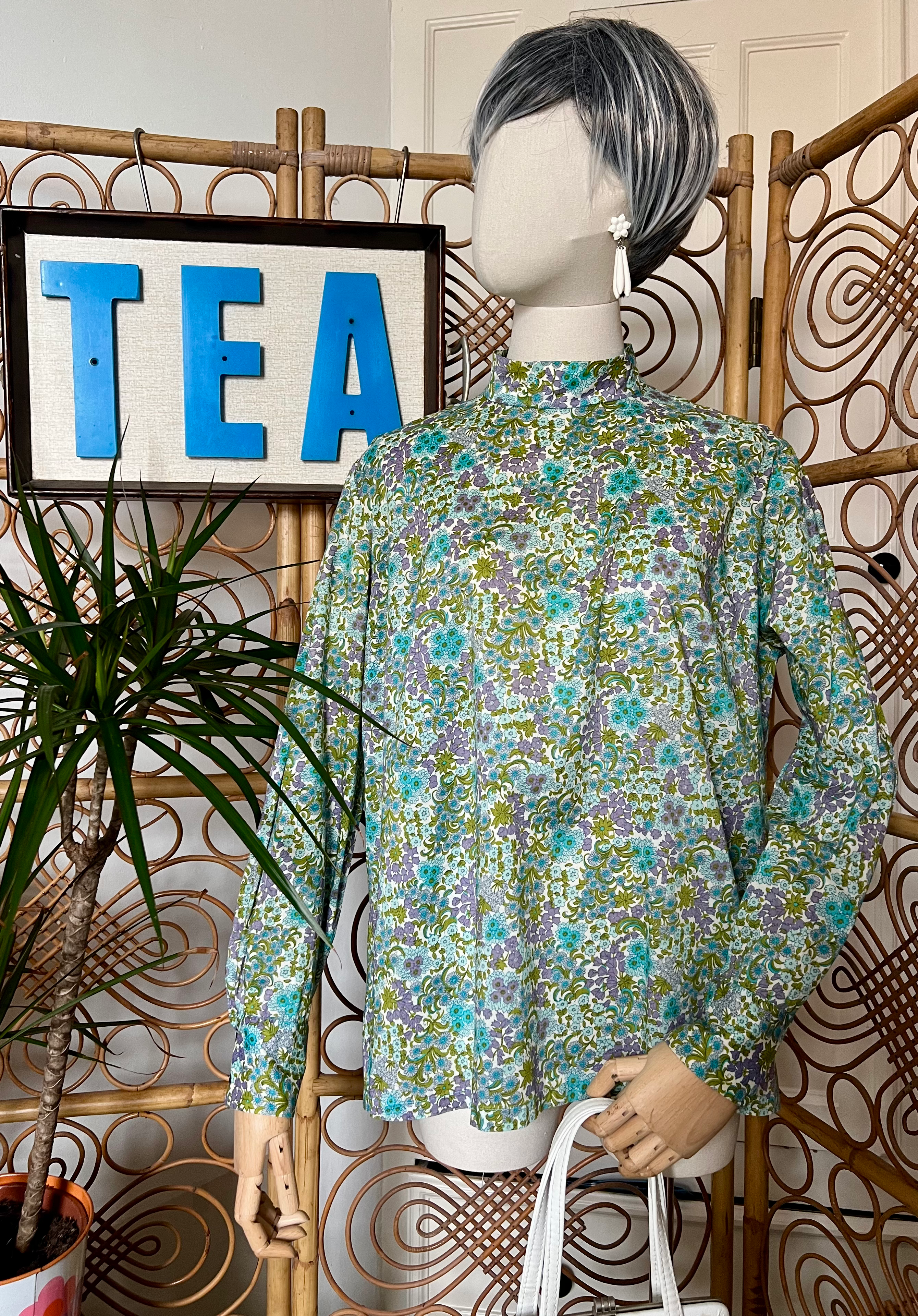 1970s Turquoise Floral Print Cotton Rear Button Back Blouse Front View