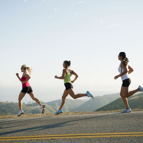 How should you warm up for a long distance run?