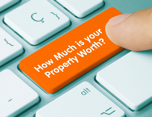 Keyboard button saying "How Much is Your Property Worth?"