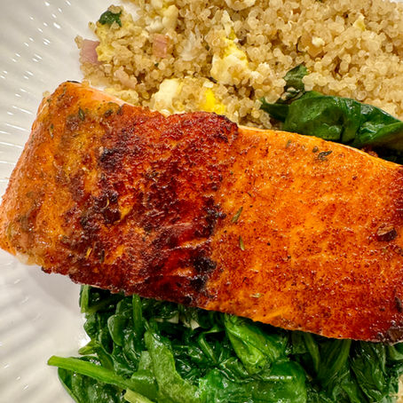Pan Seared Salmon with Egg Fried Qunioa & Sauteed Spinach