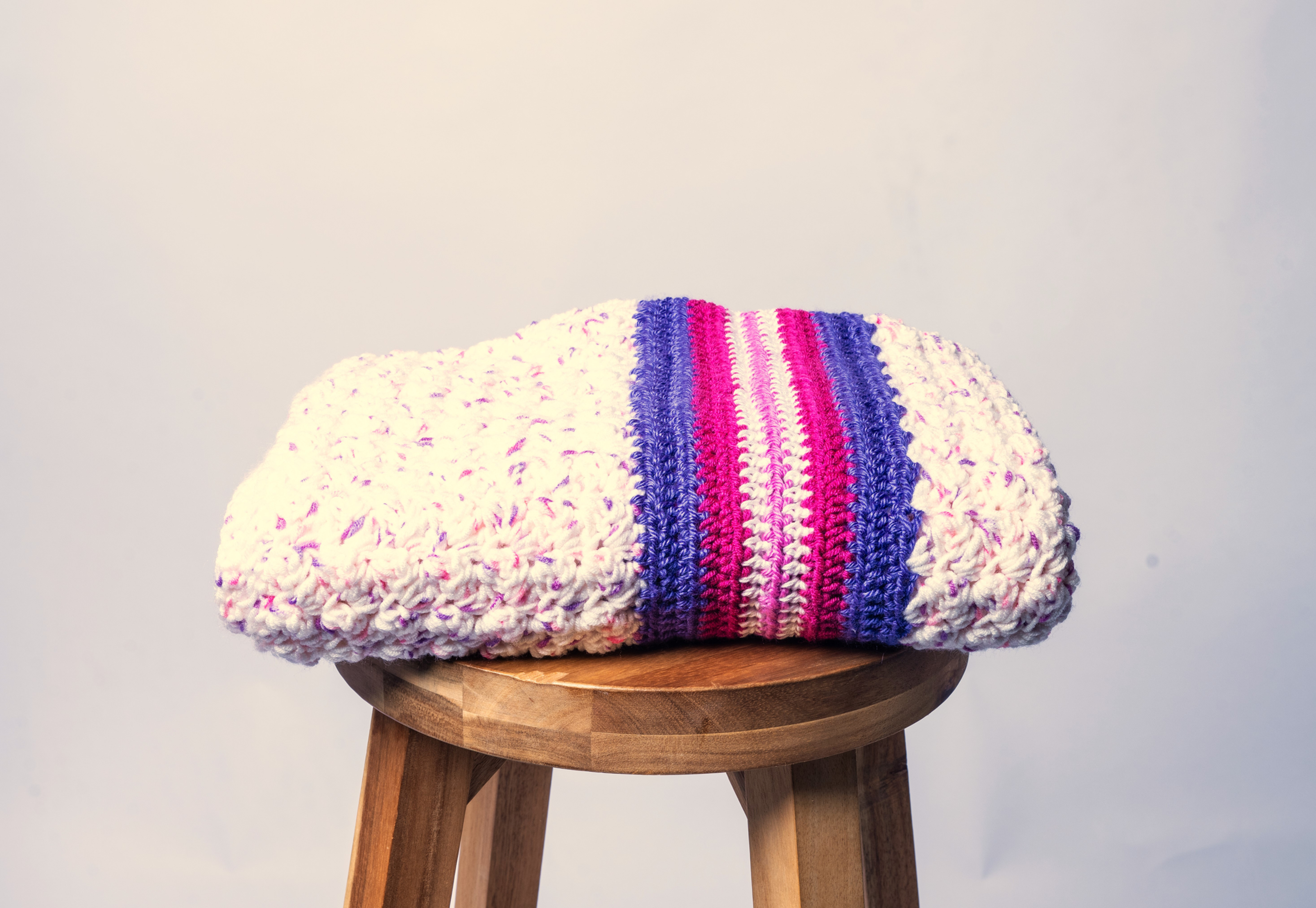 Flecked purple and pink baby blanket