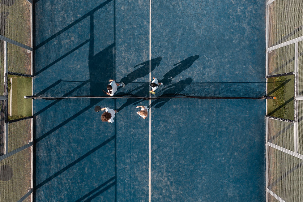 People Playing Padel Tennis
