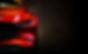 red-modern-car-headlights-on-black-background_edited.jpg