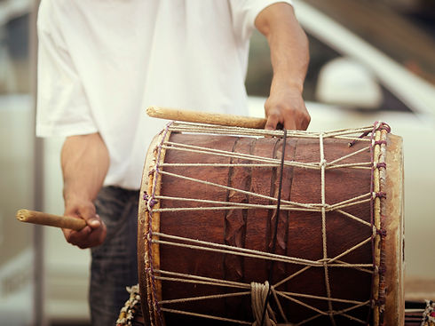 Man Playing Drum