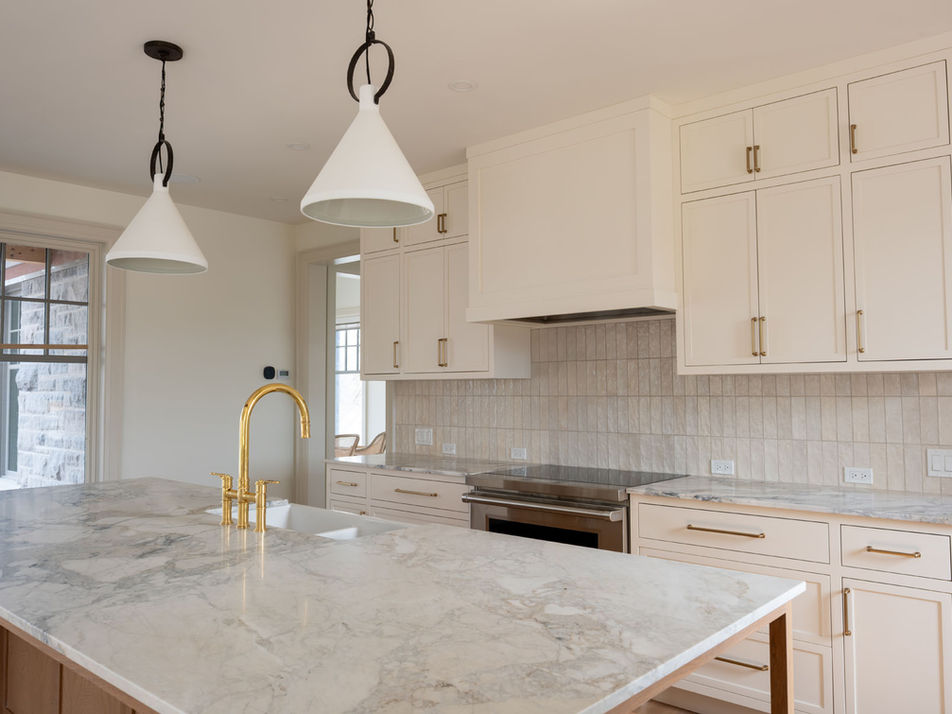 White Cabinets and Quartz Countertop in Kitchen
