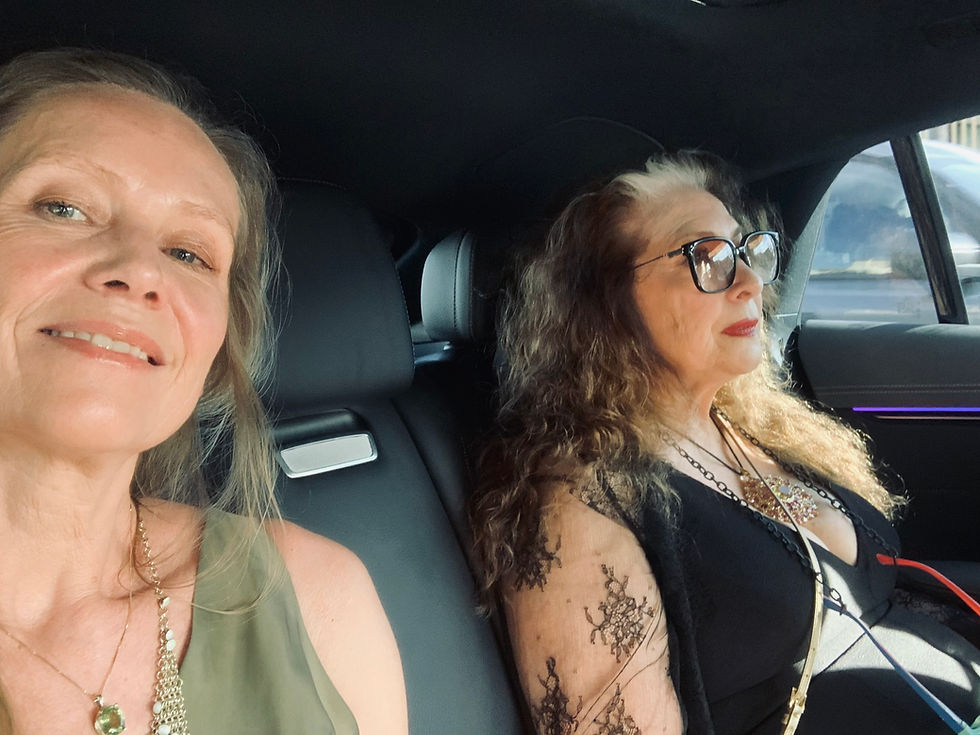 Me wearing a necklace made of a beautiful turmaline which I won when I became Designer of the year at Inhorgenta Fair in Munich, Germany 2025. With Cynthia Bach.