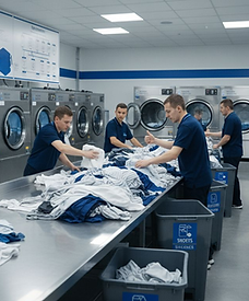 Staff working on commercial laundry
