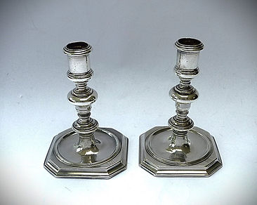 A Very Rare Pair of James II Cast Candlesticks