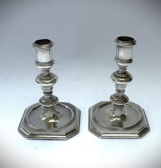 A Very Rare Pair of James II Cast Candlesticks