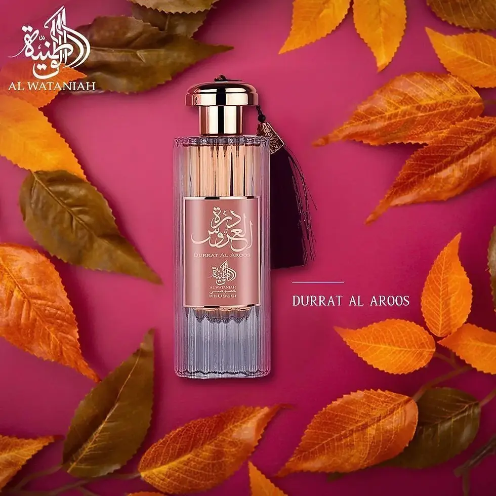 Miniatura: Frasco de perfume DURRAT AL AROOS, rodeado por folhas outonais, AL RASASI PERFUMES.