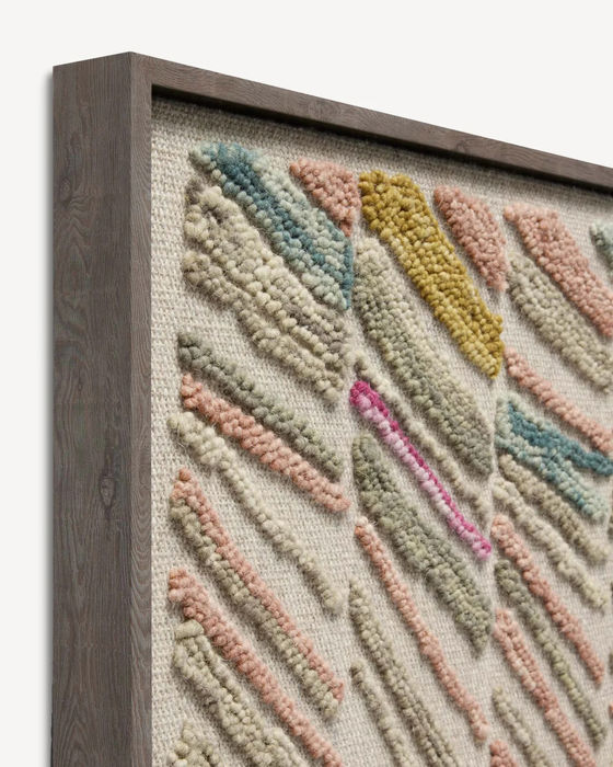 Colorful wool textile art piece in wooden frame
