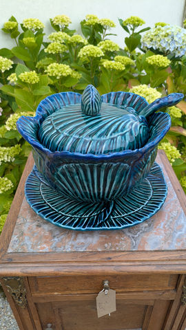 Range of vintage dining collectibles, from candles to bowls to vintage china.