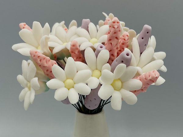 Porcelain Daisies and Bud flower stems in vase by Philippa Whiteside