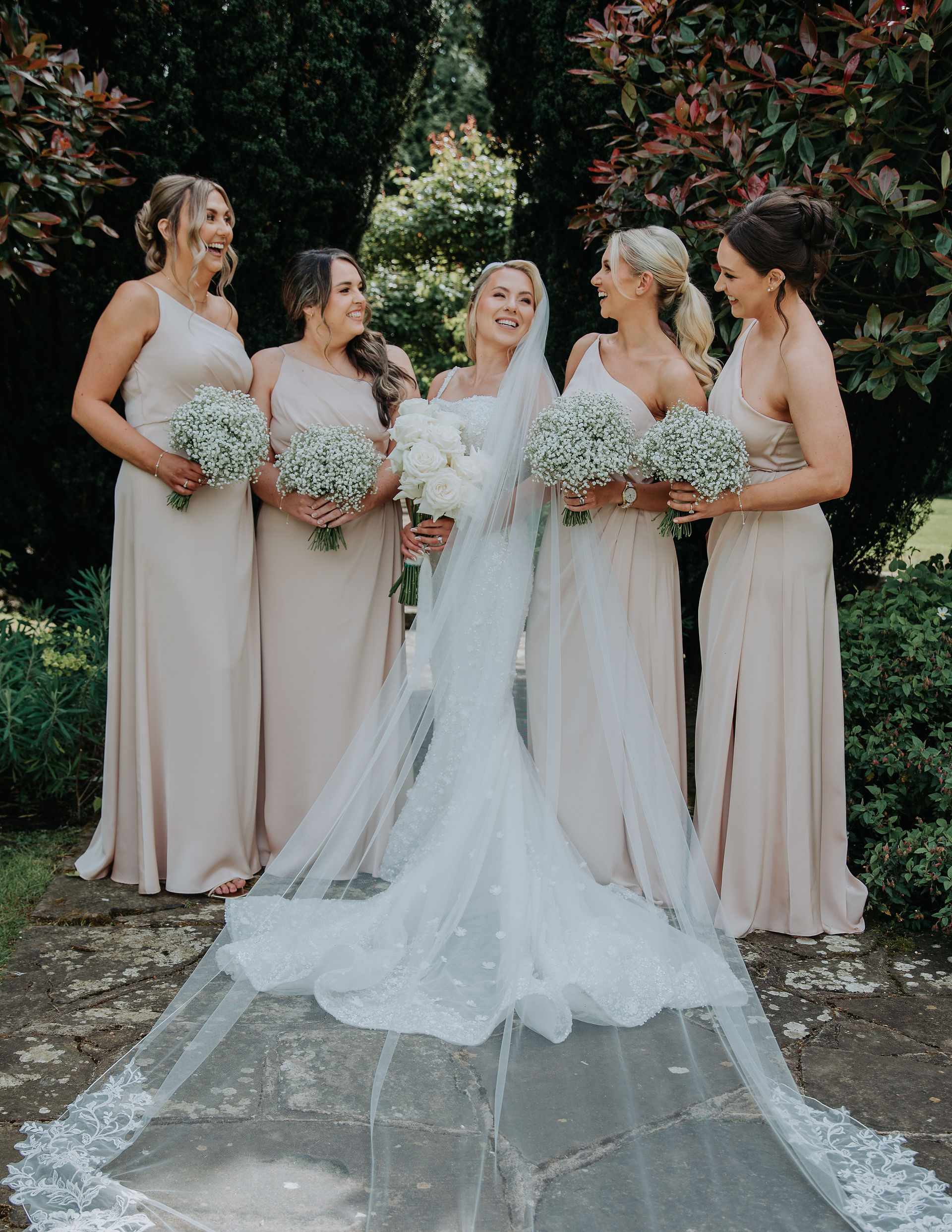 bride and bridesmaids at Hayne house wedding venue kent