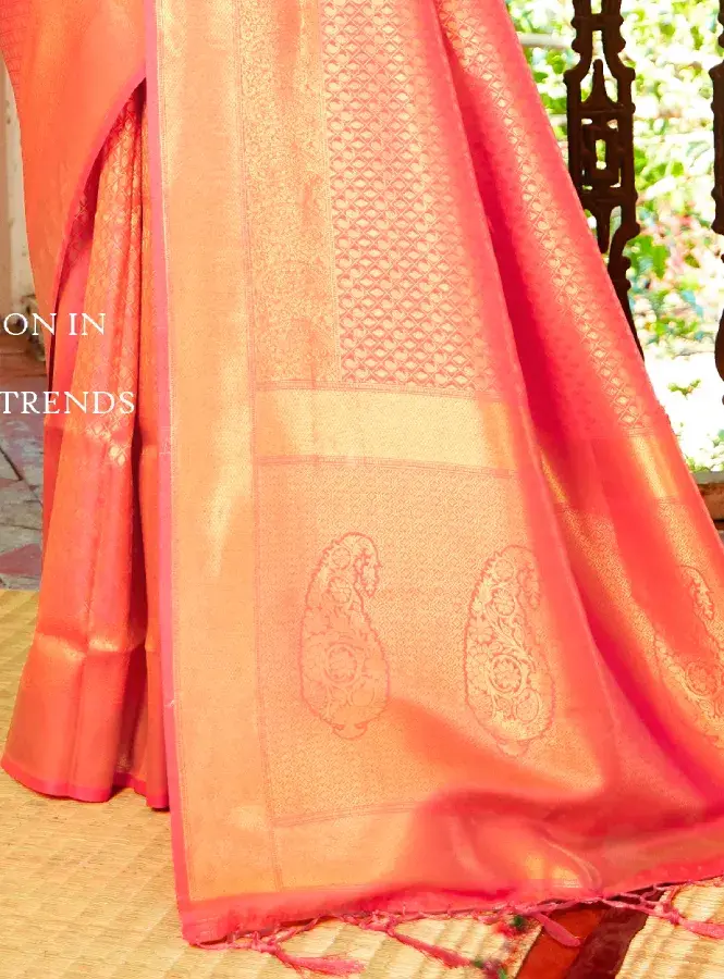 Thumbnail: Elegant Orange Silk Saree with Luxurious Gold Border