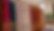 Eye-level view of colorful sarees hanging on a rack