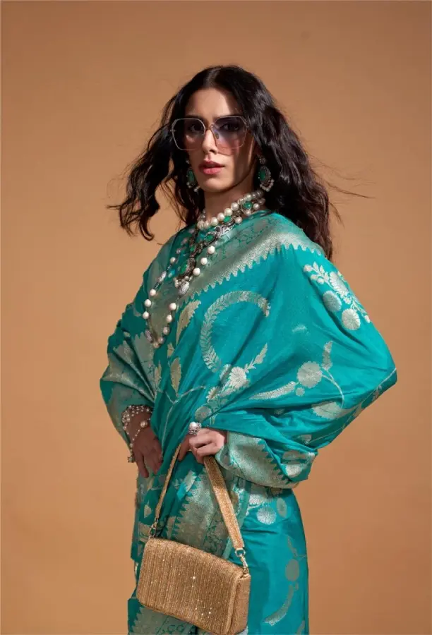 Thumbnail: Women Floral Woven Georgette Saree with Tassels-Blue