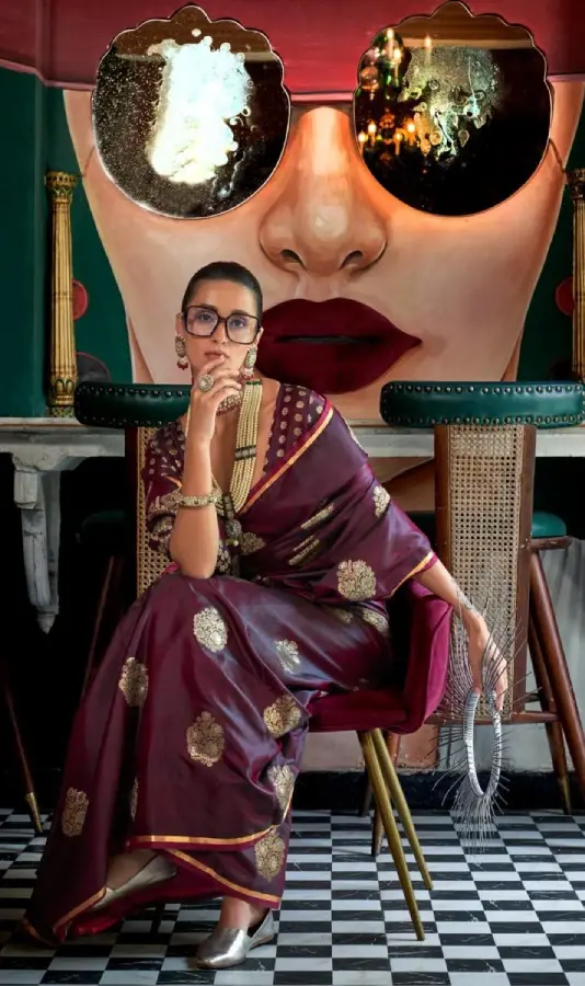 Thumbnail: Wine Floral Design Zari Woven Satin Saree With Tassels