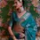 Thumbnail: Teal Woven Banarasi Organza Silk Saree With Sequins Work