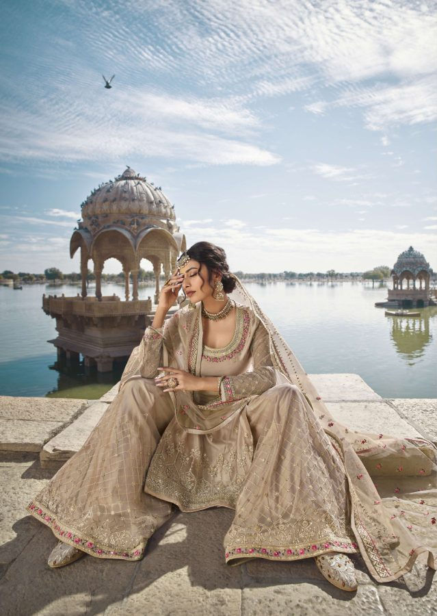 Thumbnail: Women Beige Floral Embroidered Net Semi-stitched Sharara Suit