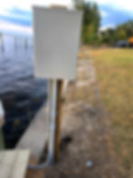 Outdoor waterfront electrical equipment installation by Harmony Electric in Southwest Florida
